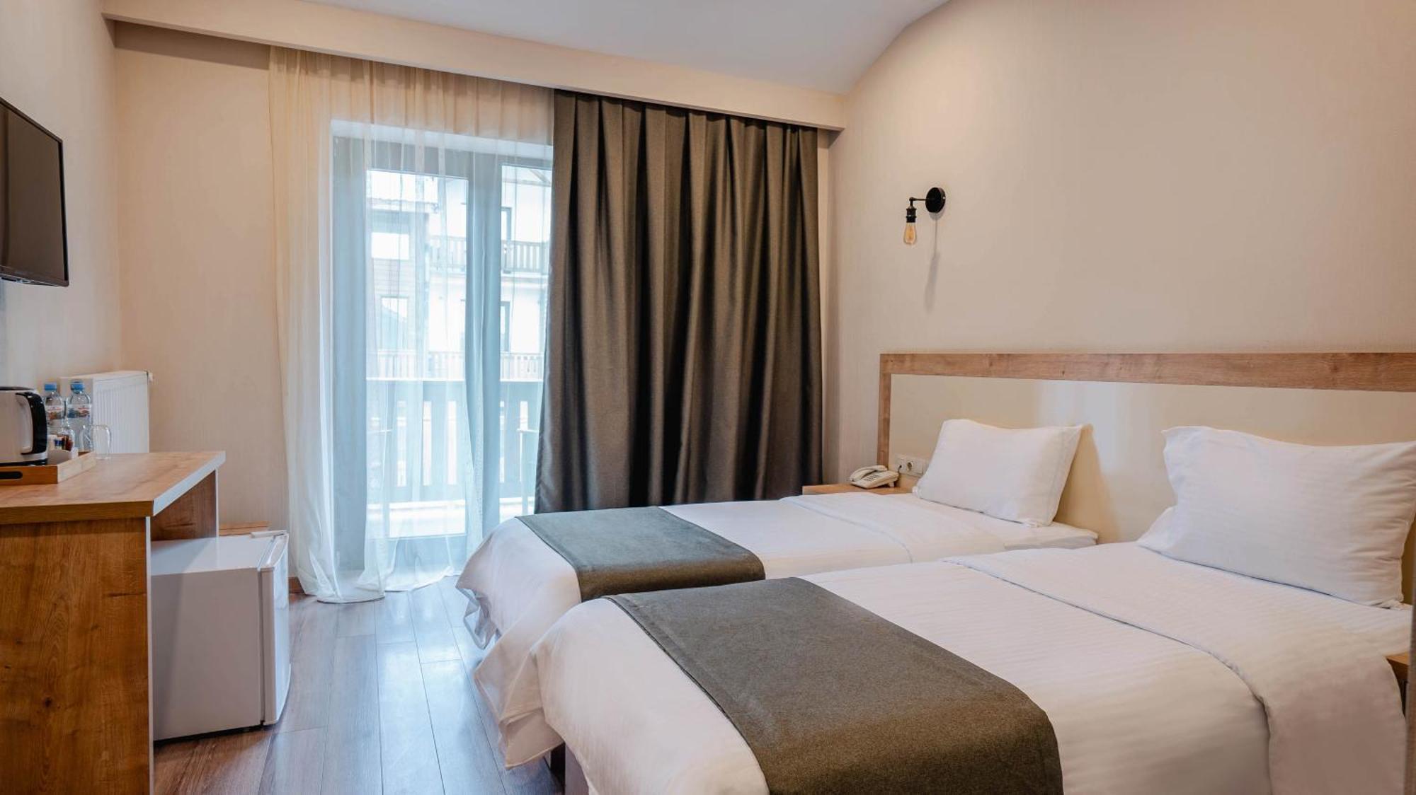 Gudauri Inn Bilik gambar A room at the hotel