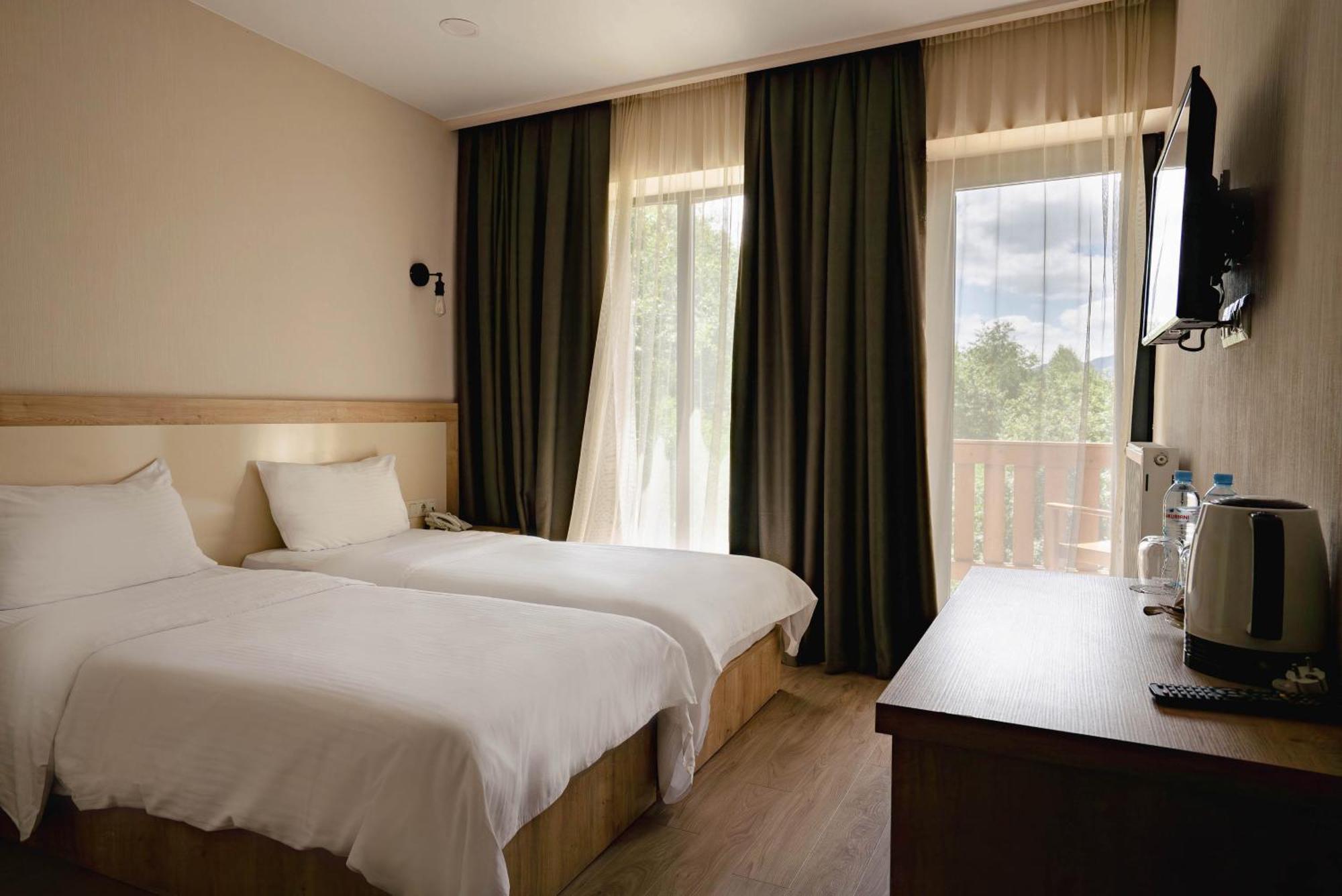 Gudauri Inn Bilik gambar A room at the hotel