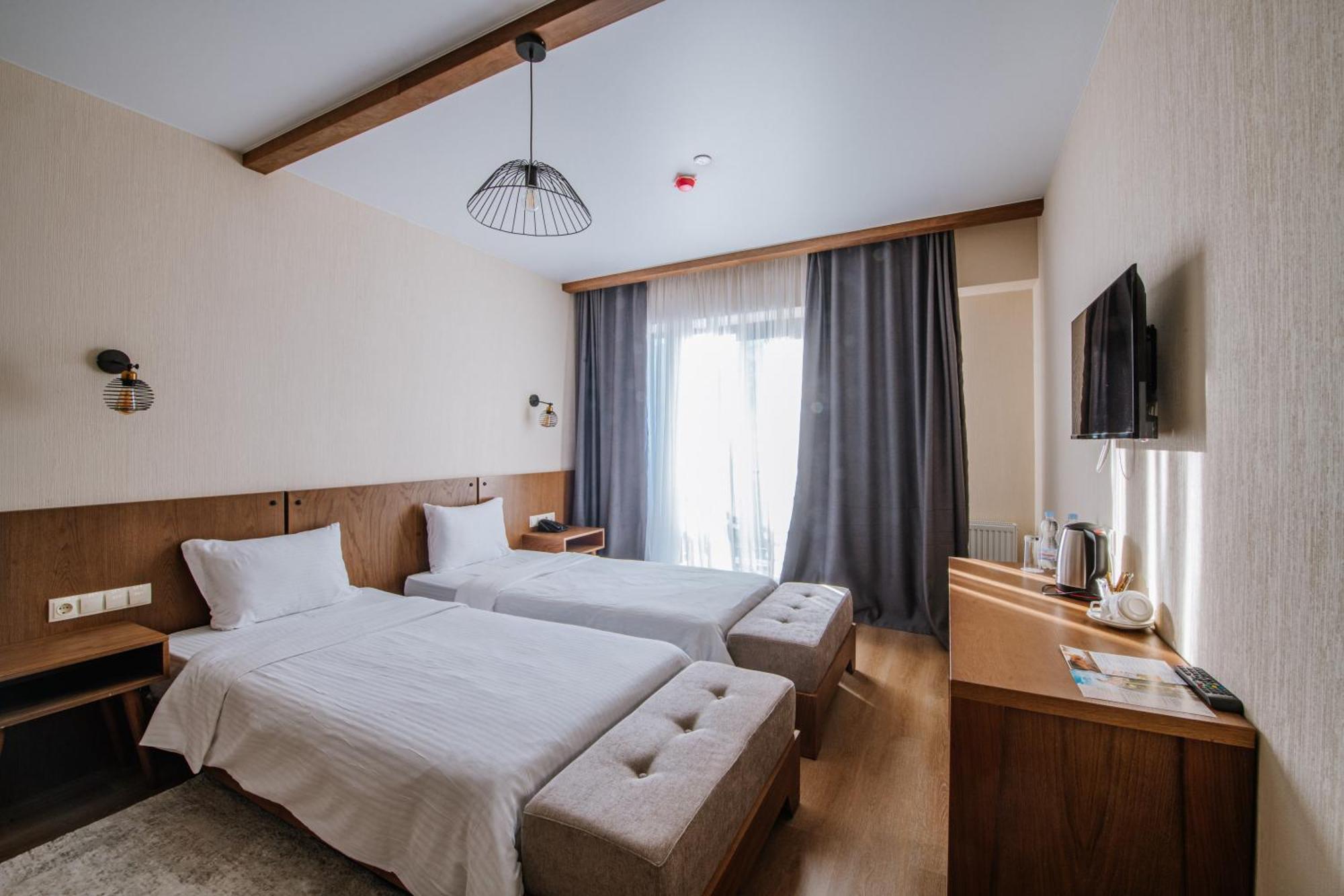 Gudauri Inn Bilik gambar A room at the hotel